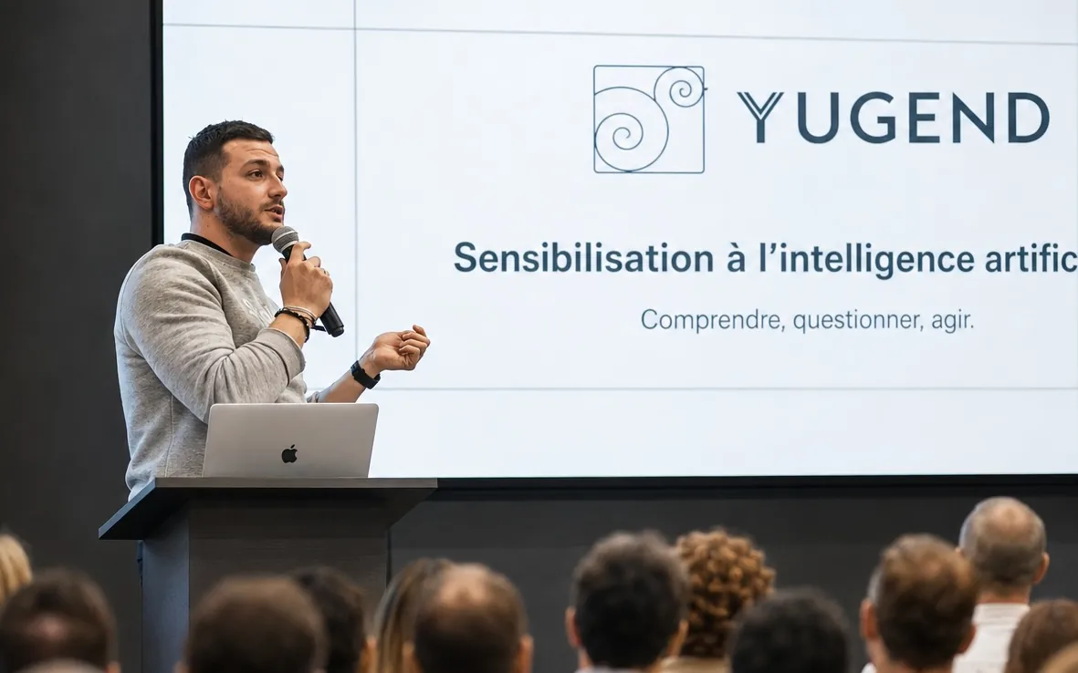 Maxime anime une sensibilisation à l'intelligence artificielle devant une salle de dirigeants
